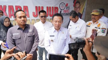 PJ BUPATI PRINGSEWU TINJAU KESIAPAN PILKADA 2024 DI BAWASLU KABUPATEN PRINGSEWU